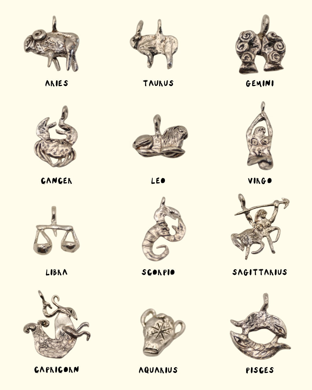 The Zodiac Pendants - Tabby Booth